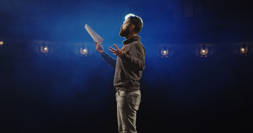 Actor performing a monologue in a theater